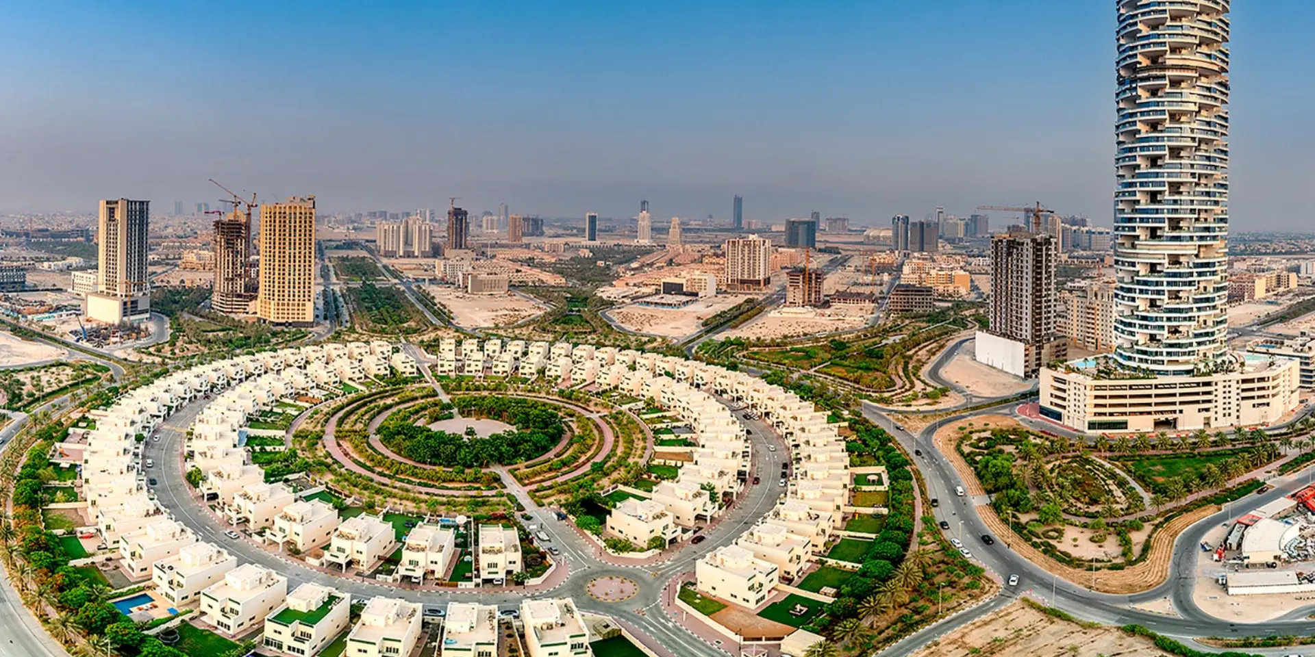 Jumeirah Village Circle family community with parks and modern homes
